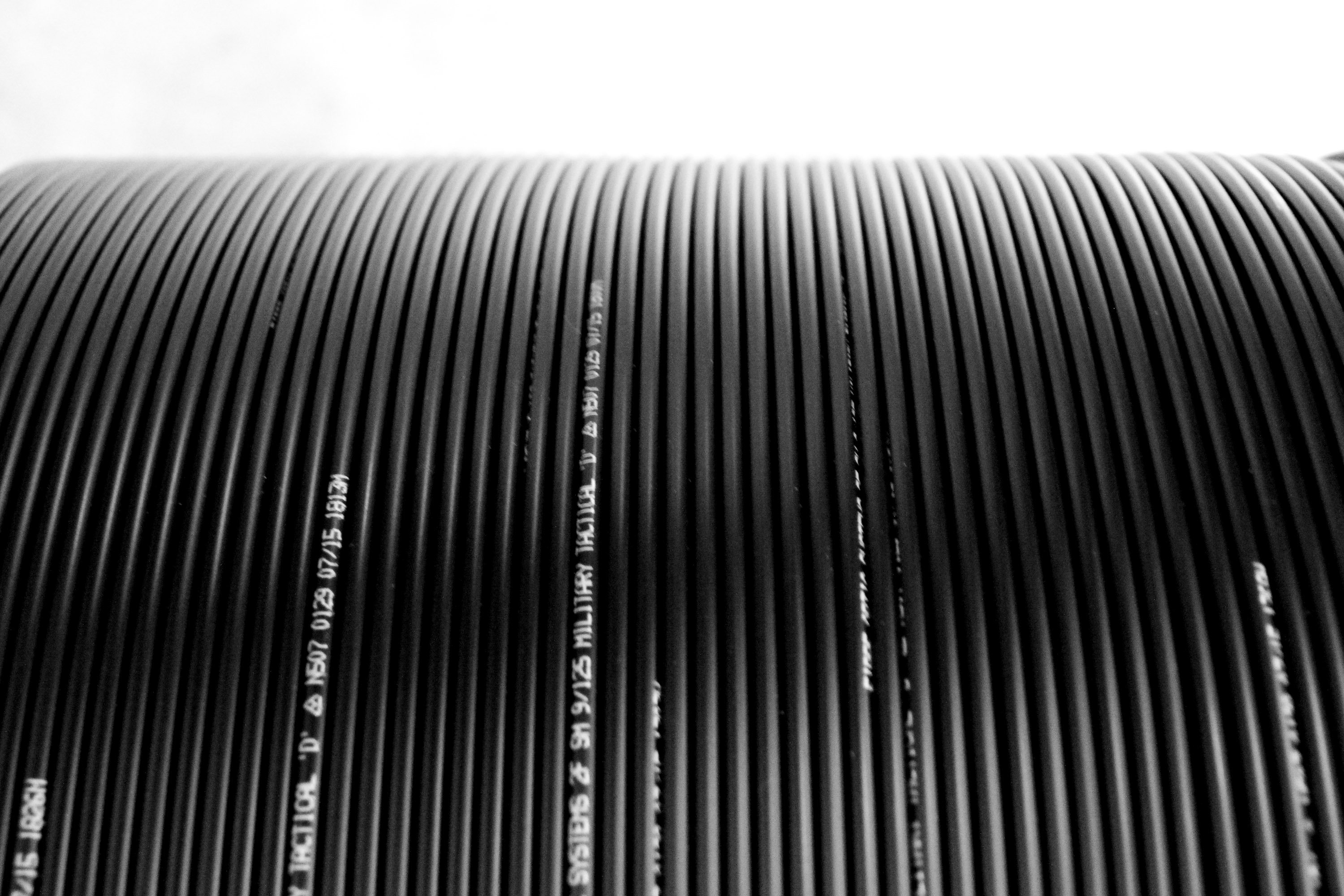 Close up on fiber cables on a drum