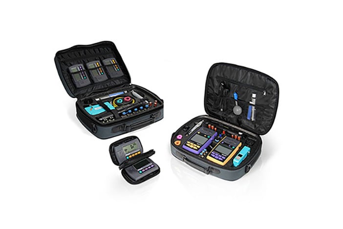 Three black boxes with testing and inspection equipment