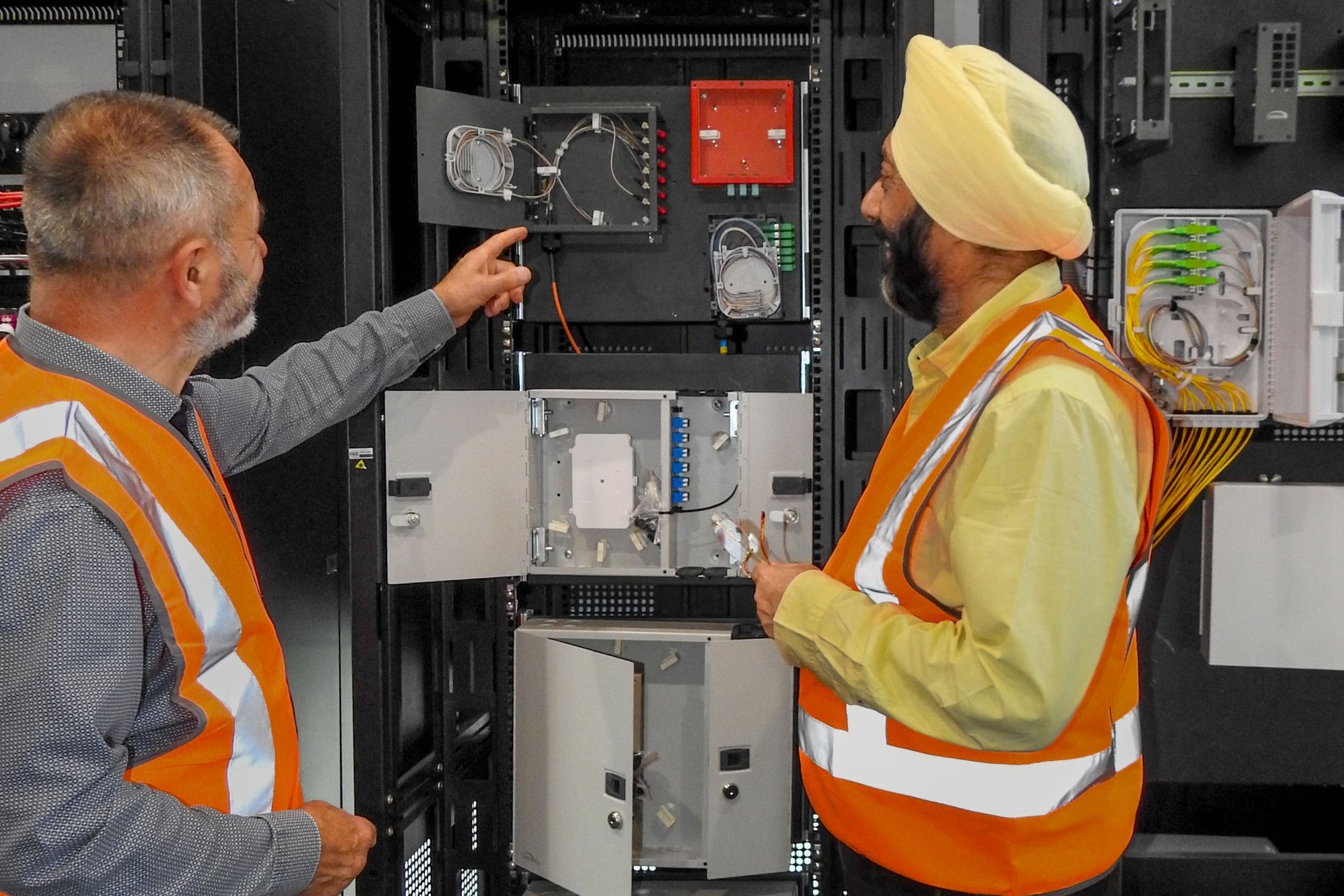 Two colleagues are looking into setup of equipment.